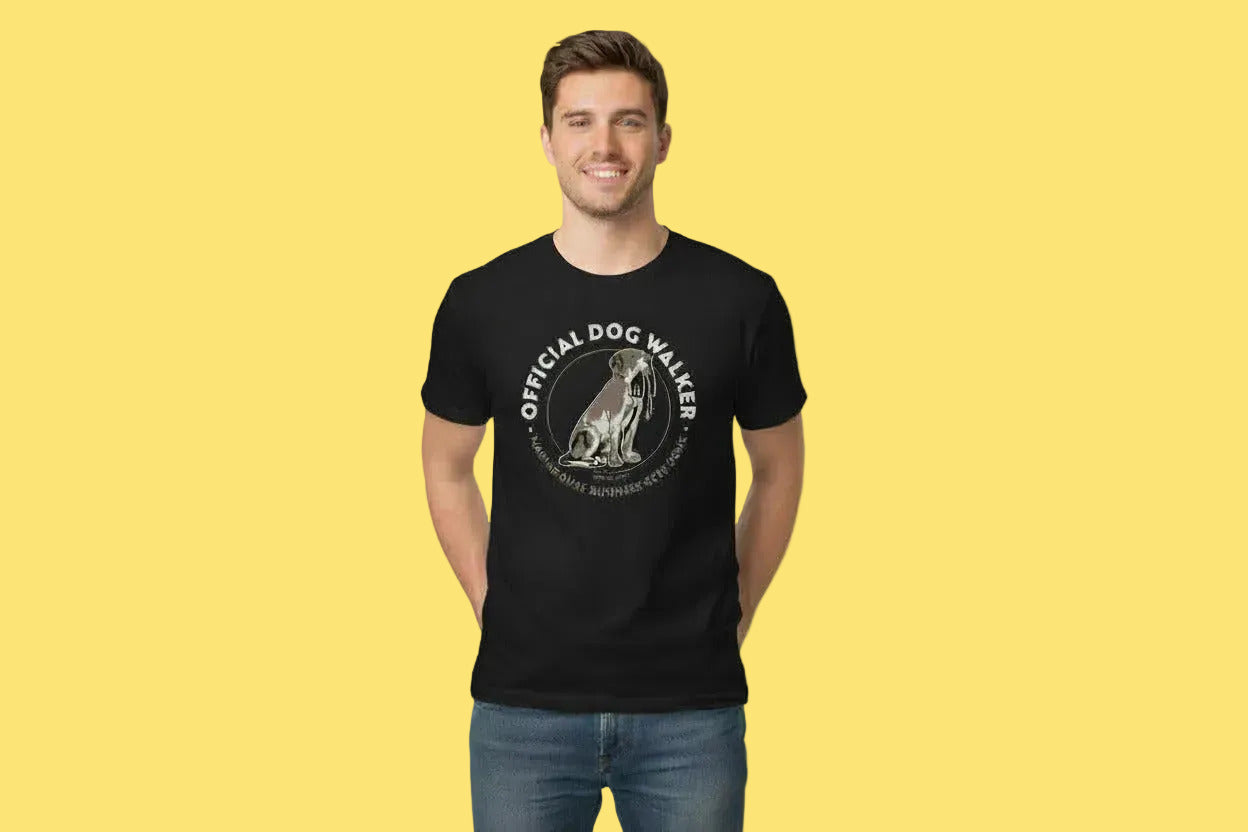 Black t-shirt with a graphic of a dog and text 'Official Dog Walker' on a white background