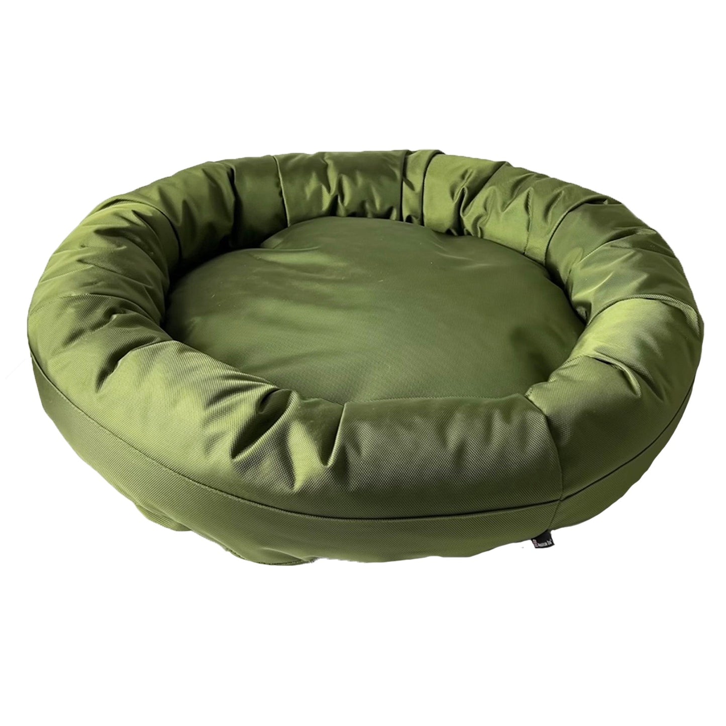 Green pet bed on a white background