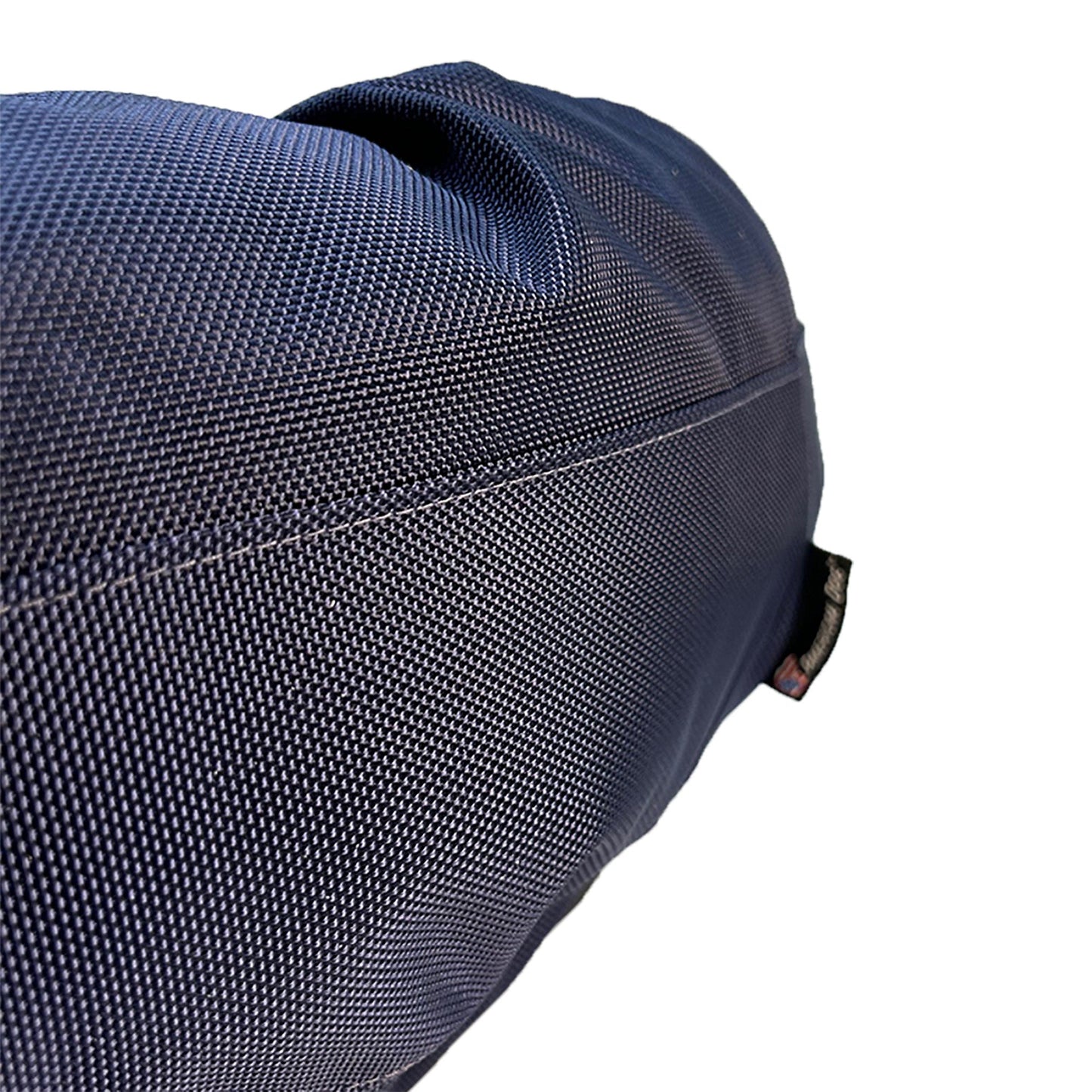 Close-up of a blue textured bag on a white background