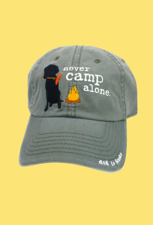 Gray cap with a dog and campfire design and text 'never camp alone' on a white background