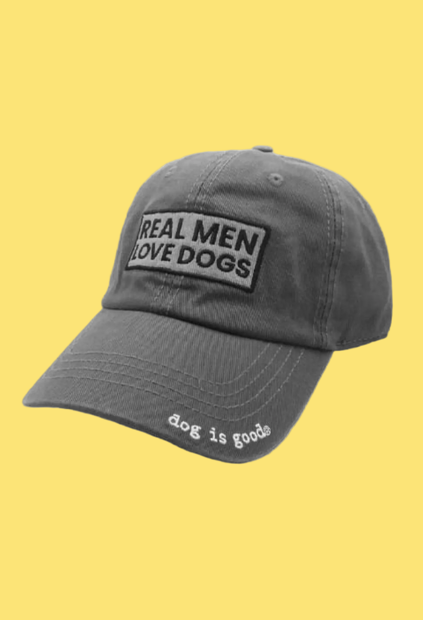 Gray cap with 'Real Men Love Dogs' patch on a white background