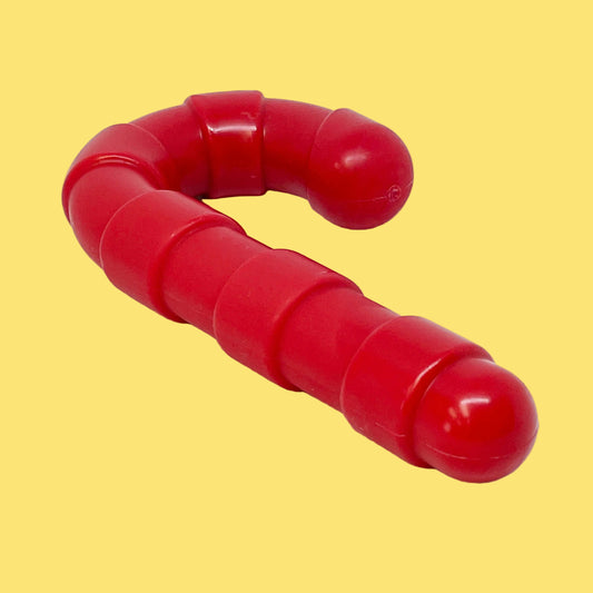 Red dog toy on a white background