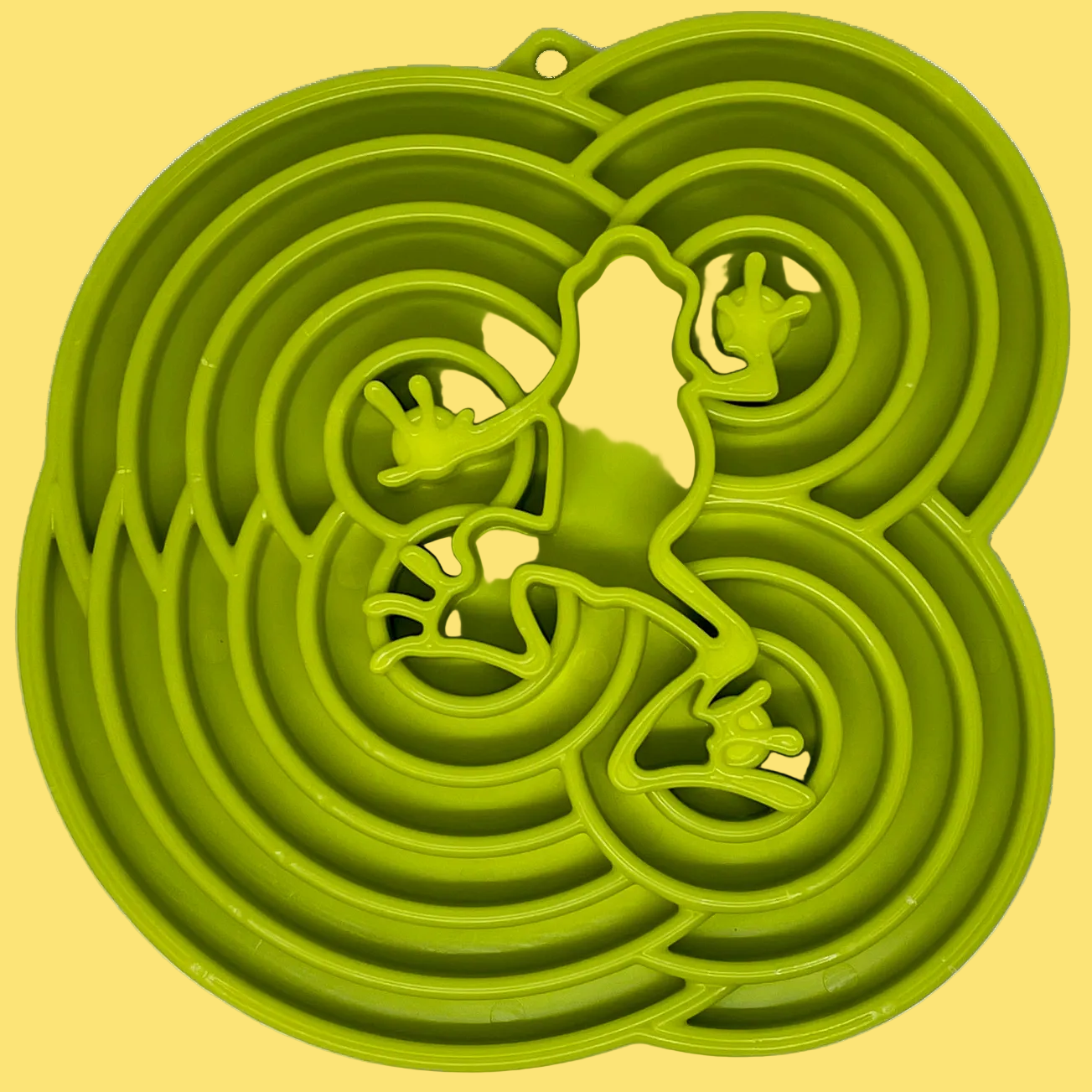 Green silicone mold with frog design on a white background