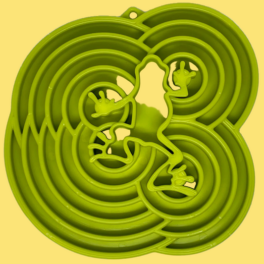 Green silicone mold with frog design on a white background