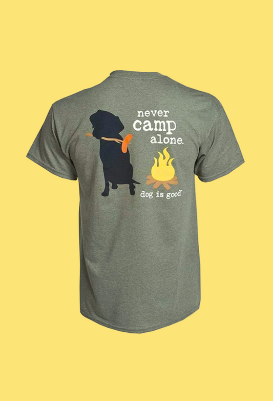 Green t-shirt with a dog and campfire graphic and text on a white background