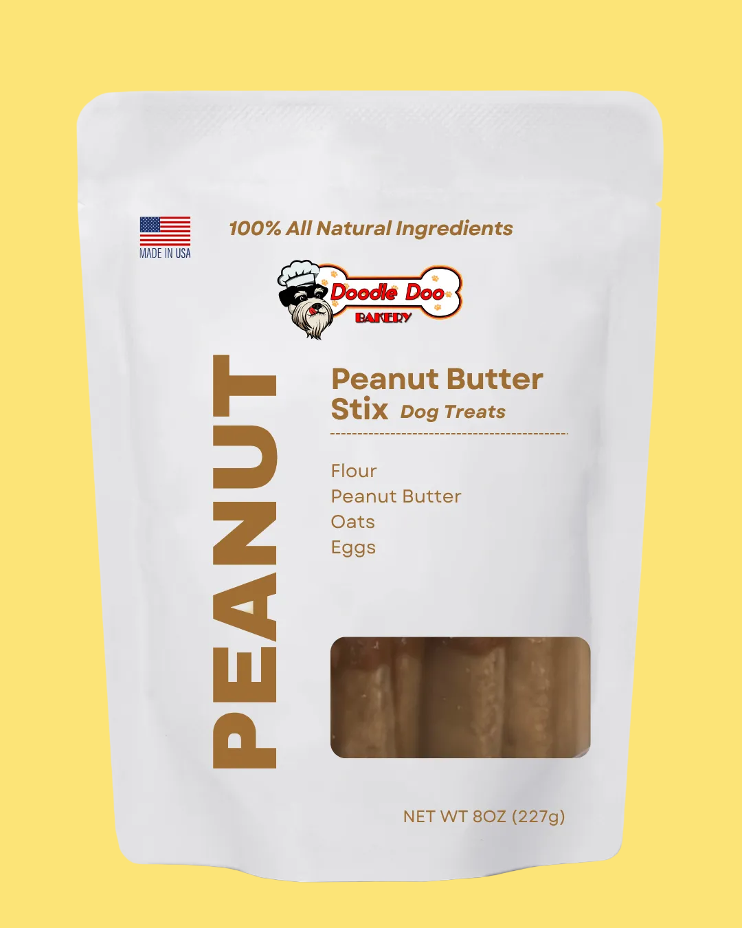Package of Doodle Dog Bakery Peanut Butter Stix Dog Treats on a white background