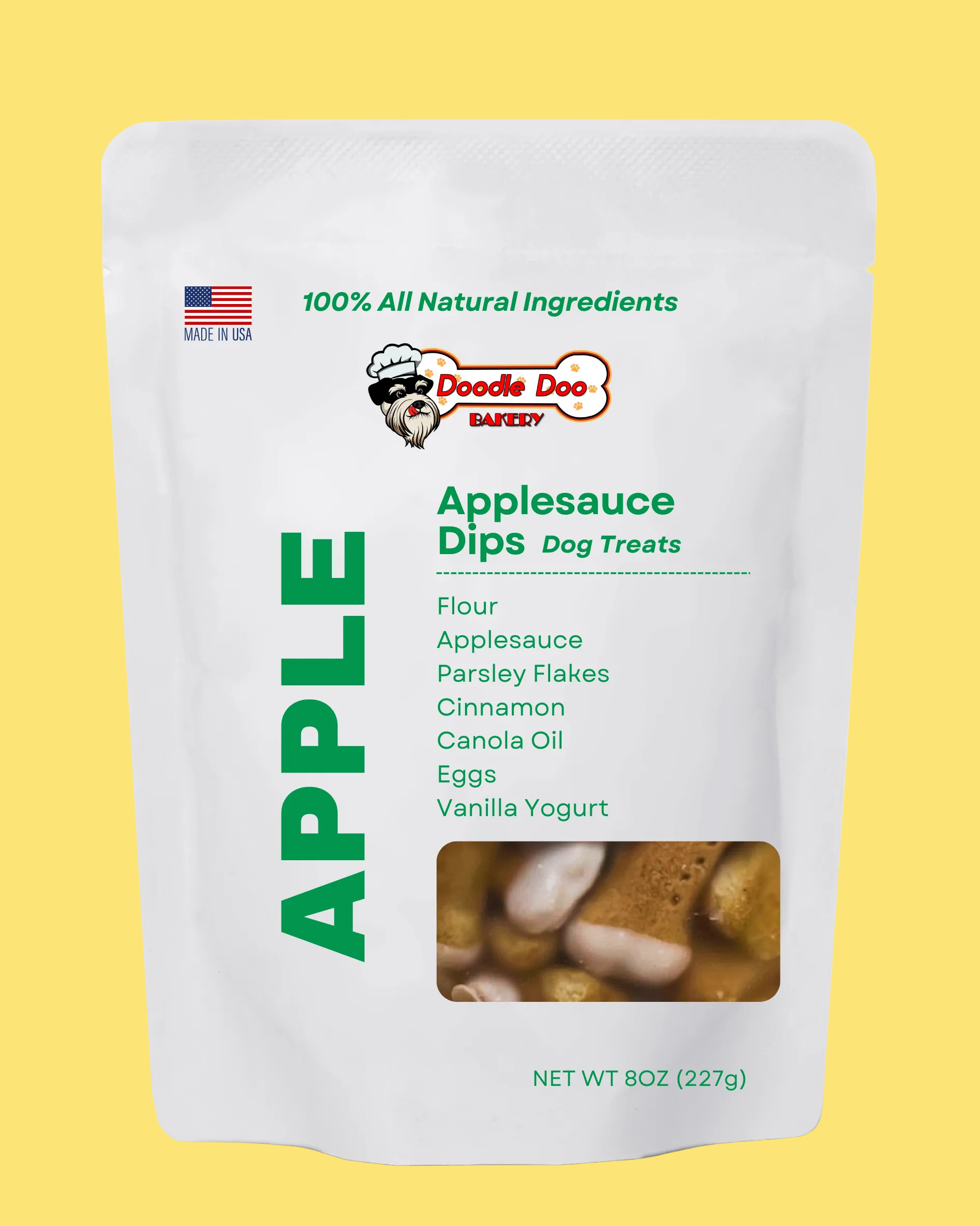 Doodle Doo Bakery Apple Applesauce Dips Dog Treats packaging on a yellow 
background