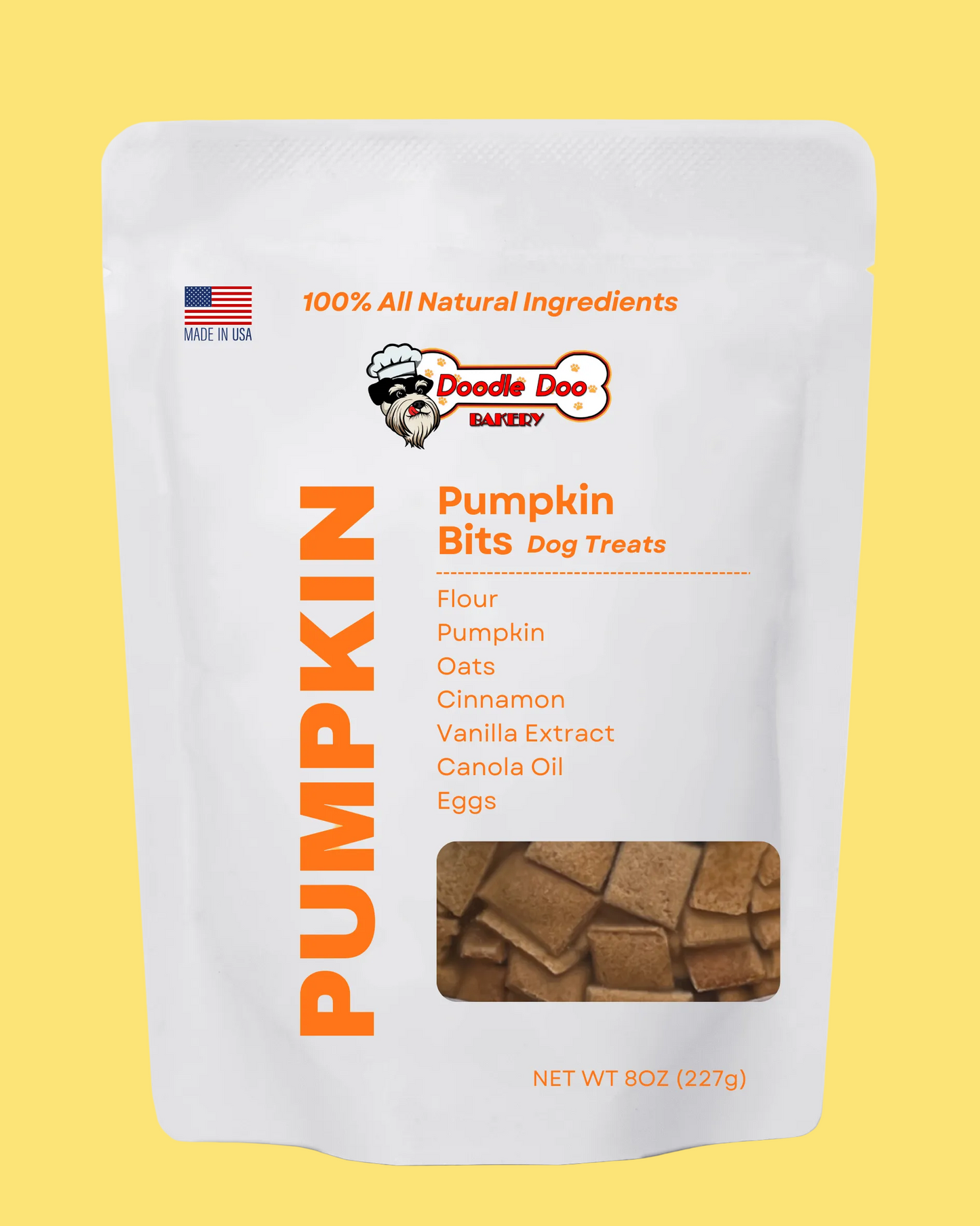 Package of Doodle Dog Bakery Pumpkin Bits Dog Treats on a yellow background